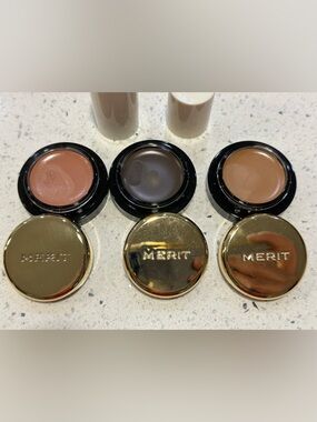 Merit eyeshadows and highlighter